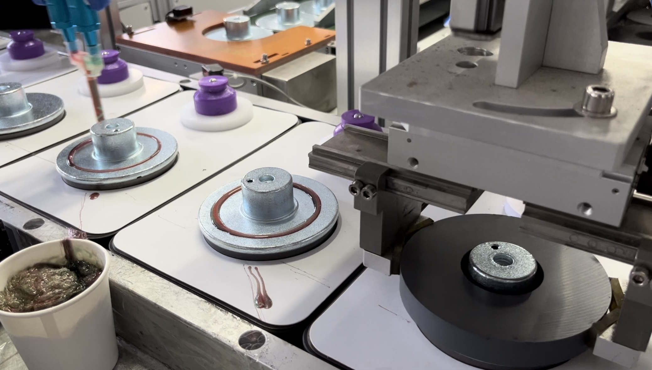 Wholesale car audio products in a warehouse with speakers and amplifiers.