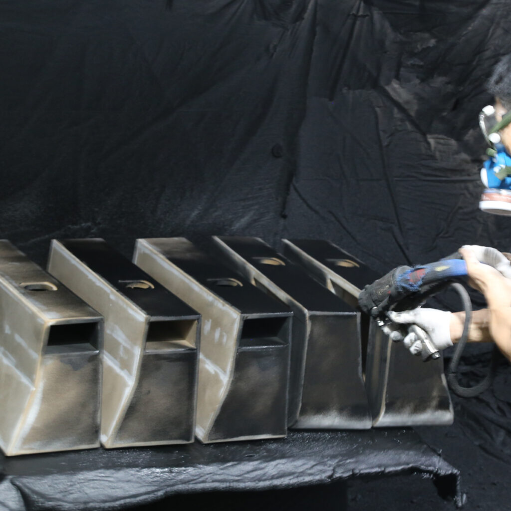 Custom MDF subwoofer enclosure assembly line